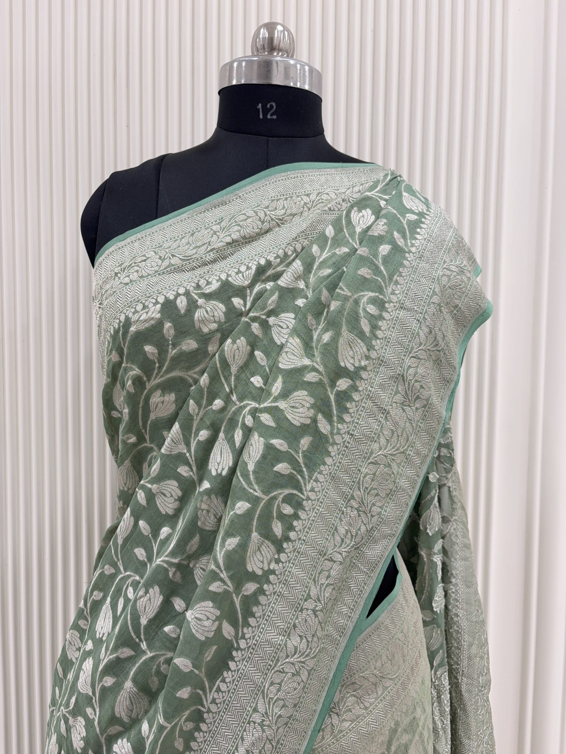Pure georgette sage green floral jaal and silver zari weaving saree-Garima
